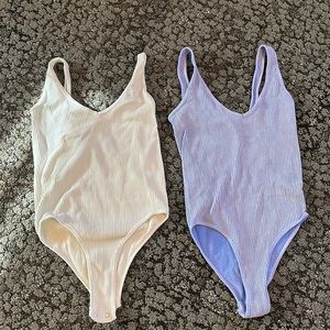 Set of two plain bodysuits